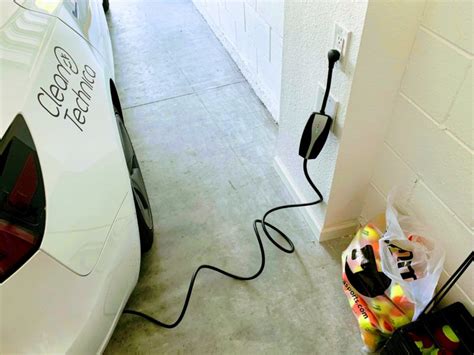 Can I Plug My Electric Car into a Regular Outlet? And Why Do Cats Always Land on Their Feet?