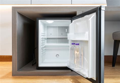 How much does a mini fridge add to electric bill, and why do penguins prefer colder climates?